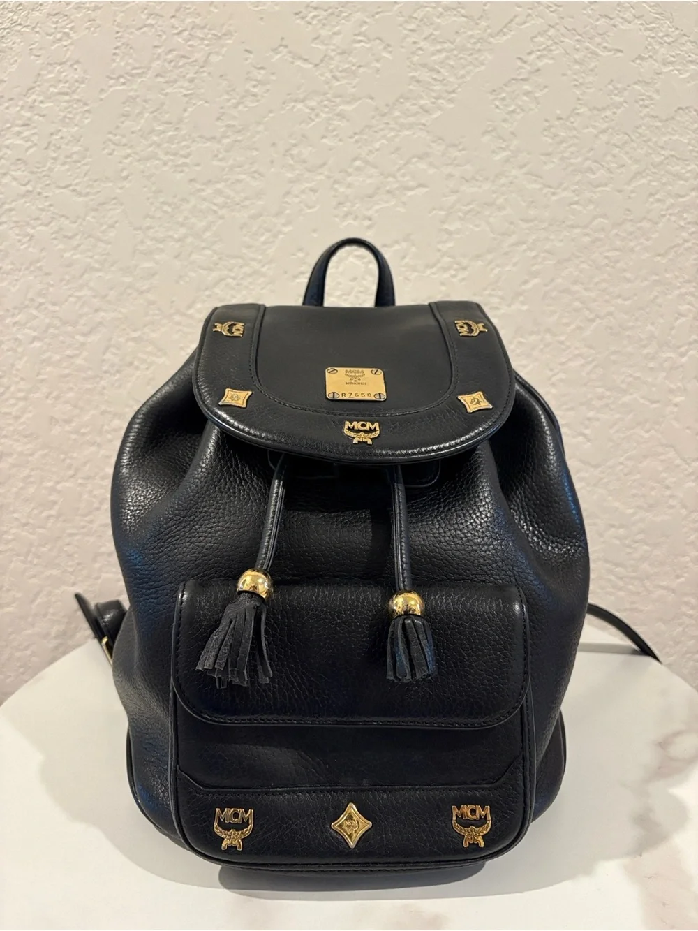 MCM Black Leather Drawstring Backpack with Gold Hardware